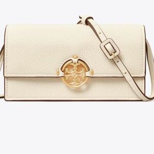 MILLER WALLET CROSSBODY  
Color light cream NWT and dust bag